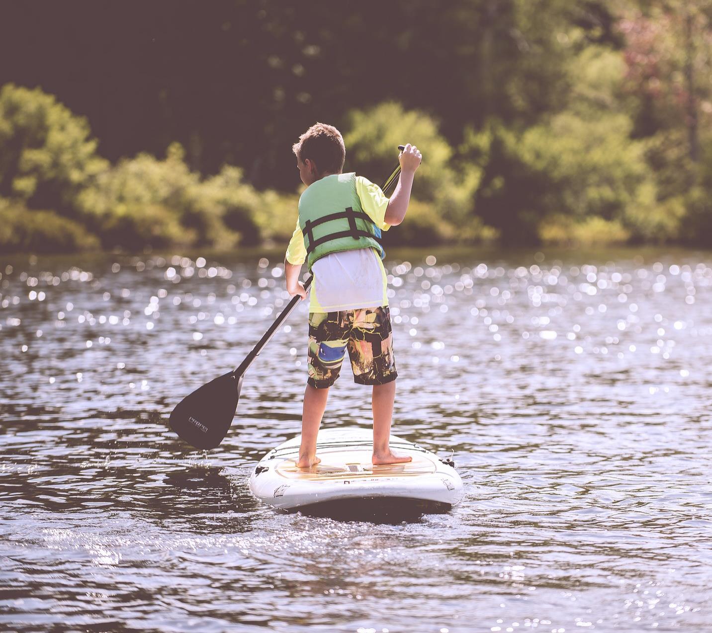 Stand up paddling kid